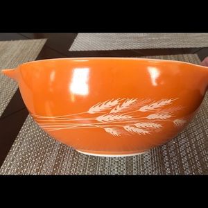 Beautiful orange wheat pattern vintage Pyrex bowl.